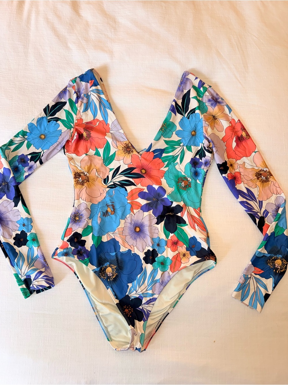 O’Neill Floral Long-Sleeve Hawaiian One-Piece Swimsuit in Blue, Coral, Teal